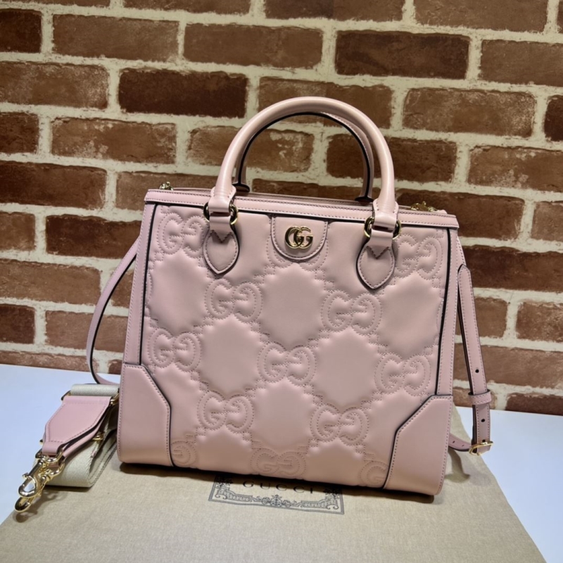 G*u*i shopping bags